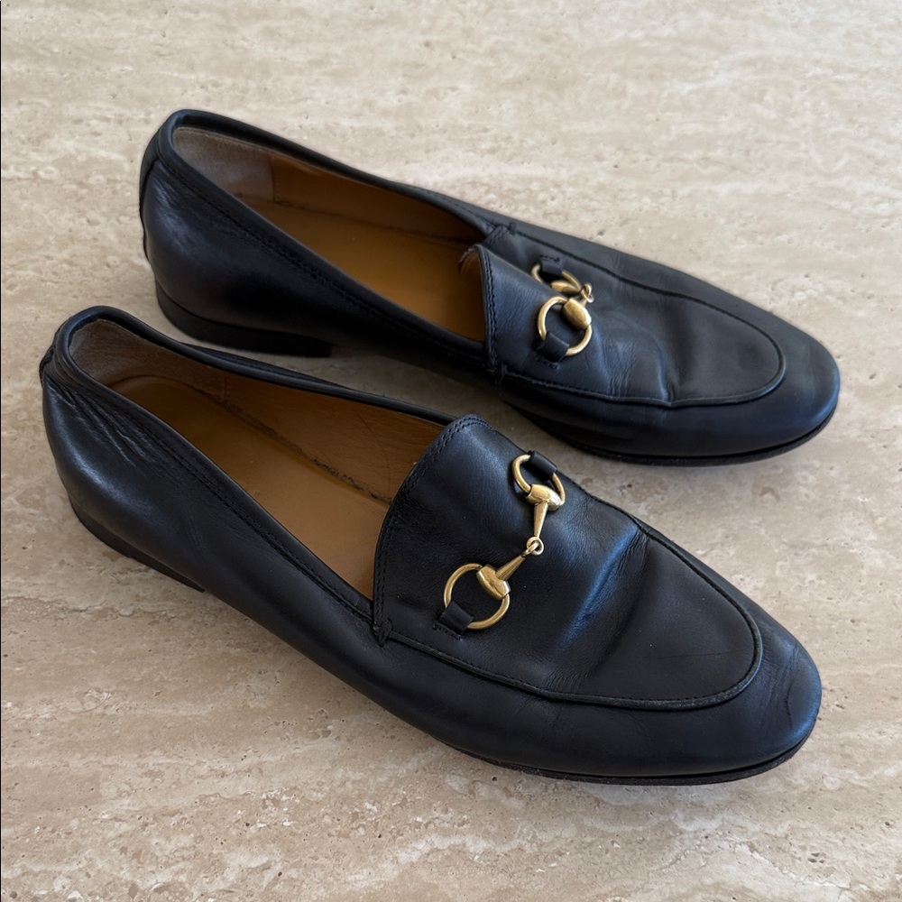 Gucci Black Leather Loafers with Gold Accents